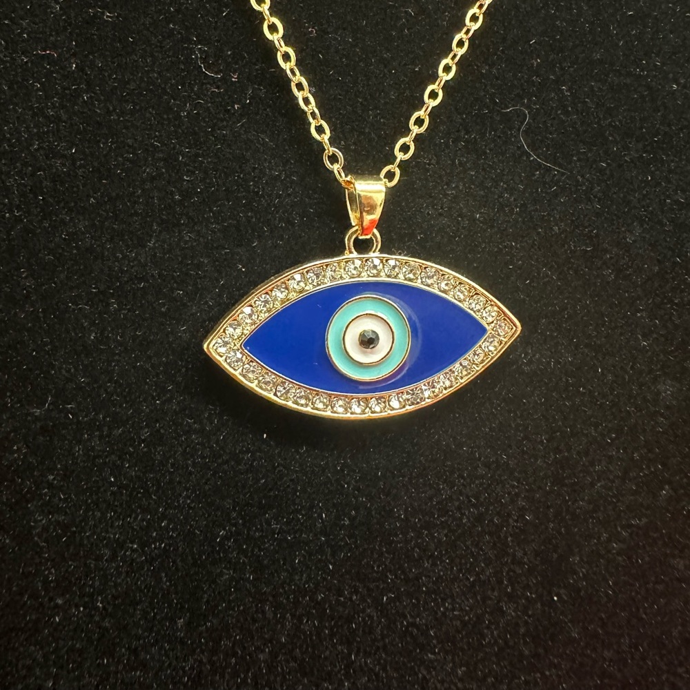 gold tone chain with turkish eye pendant